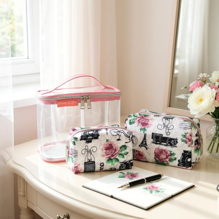 4-piece Paris & Roses print cosmetic set with clear pink-trimmed case, two floral pouches, and a larger matching printed case.