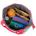 Watermelon print Fridge Pak insulated lunch tote filled with food, drinks, and a purple container.